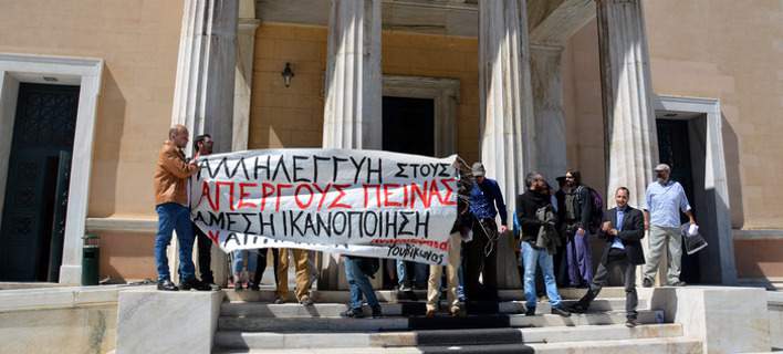 Waves of public building captures across Greece