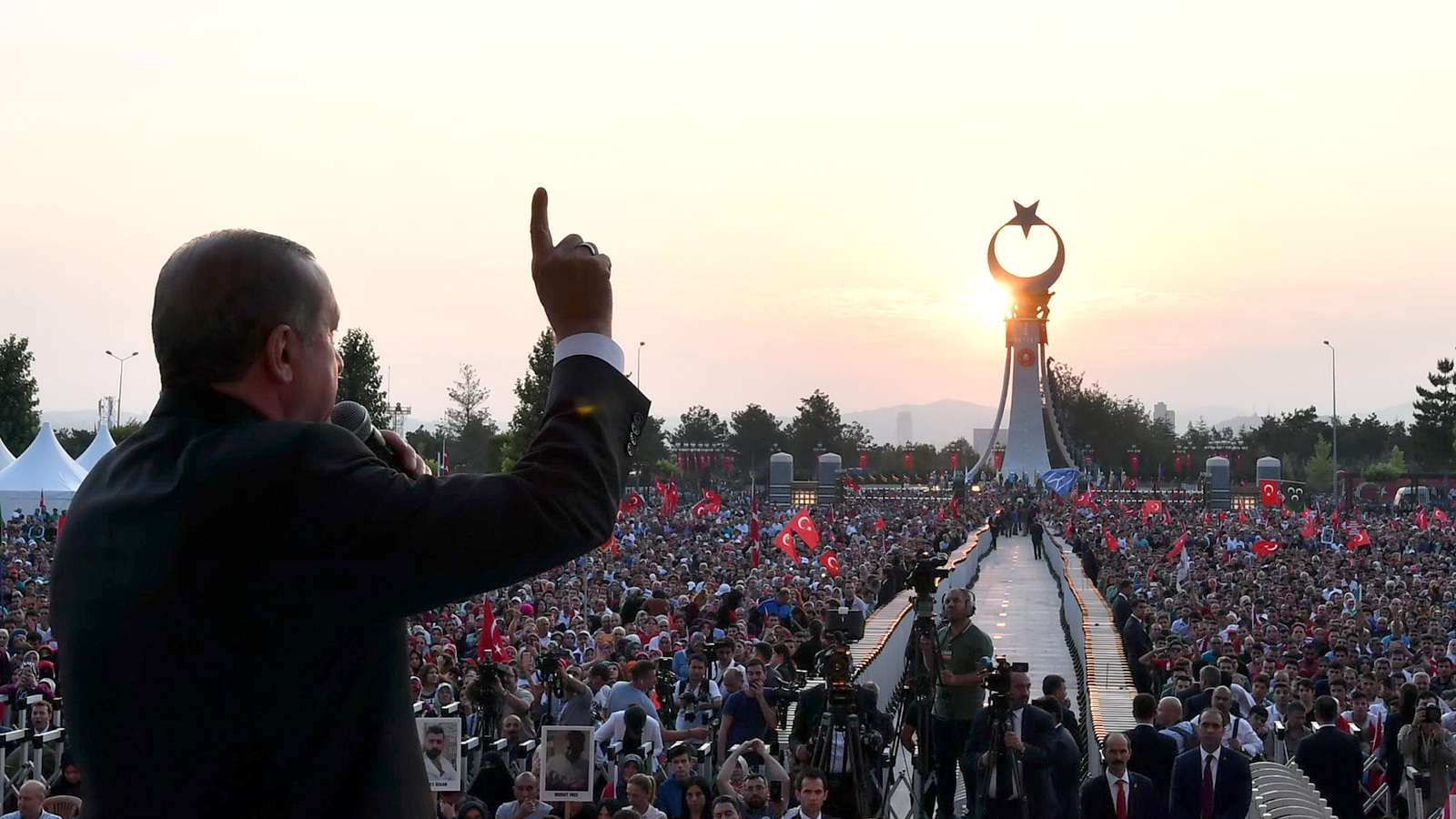 Hundreds of thousands take to the streets in Turkey to celebrate the anniversary of the failed coup attempt