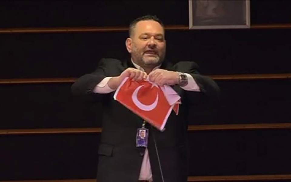 Greek far-right MEP tears up photocopy of the Turkish flag