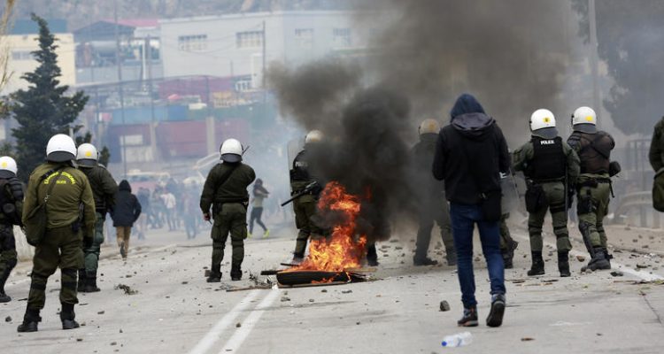Violence breaks out on island of Lesvos as migrants stage protest