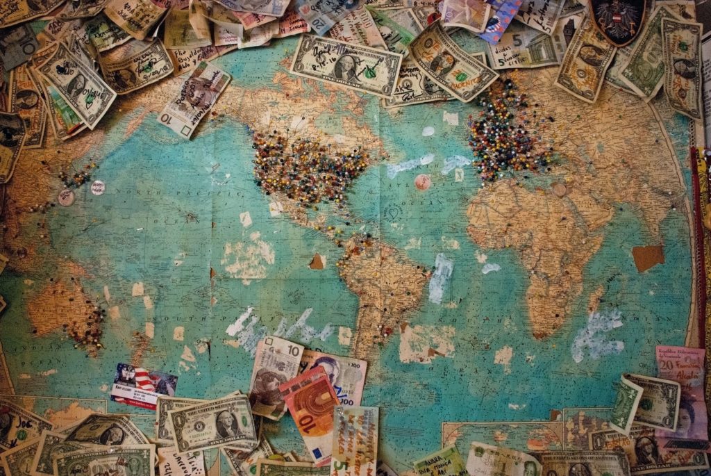 U.S. dollar banknote with map by Christine Roy